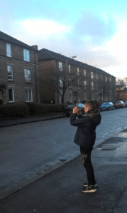 child taking pictures