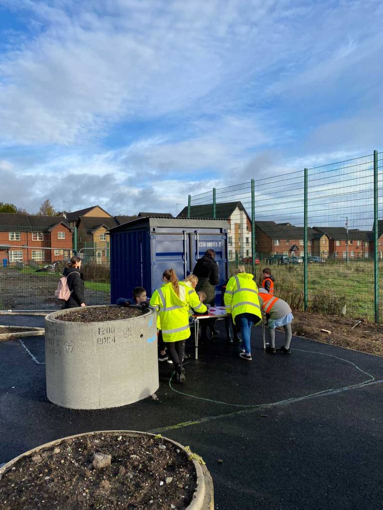 Local young people take working in an outdoor classroom, built to give better access to greenspaces